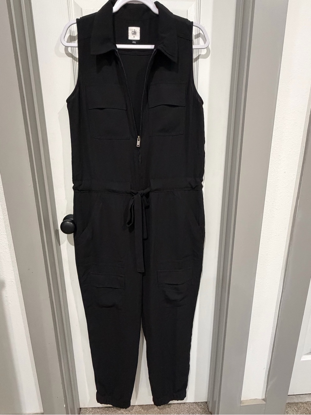 CAbi Black Sleeveless Zip-Front Cargo Jumpsuit - Picture 2 of 8